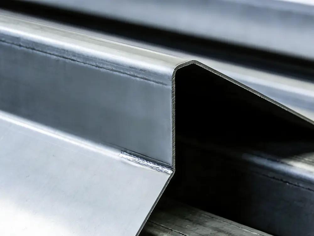 Precision bent metal component — sheet metal forming result