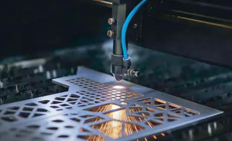 CO₂ laser cutting intricate pattern