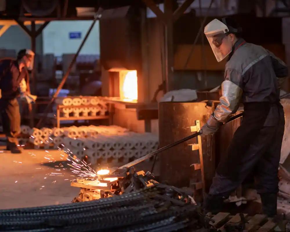Metal casting process in factory