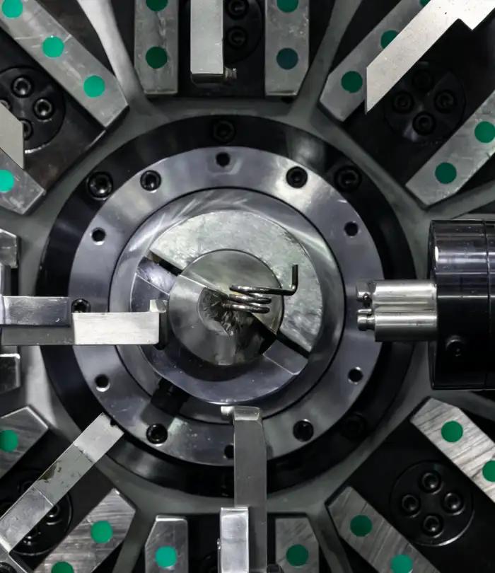 Spring manufacturing machine close-up